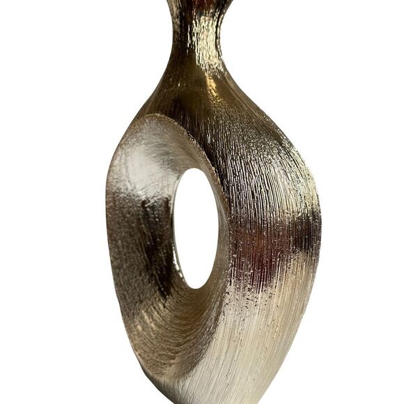 Textured silver vase, geometric oval shape with center cut out. Modern, sleek. - Picture 3 of 3